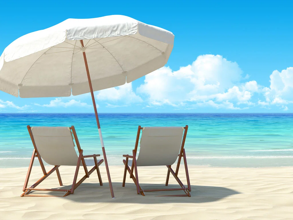 Your vacation is waiting for you Your vacation is waiting for you (stock photo of chairs and umbrella on sand with beach and bright sky in the background)